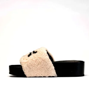 Acquista slipper in shearling logo di Tory Burch